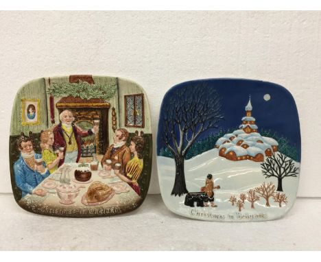 A PAIR OF FESTIVE BESWICK/ROYAL DOULTON  COLLECTOR'S INTERNATIONAL PLATES - "CHRISTMAS IN BULGARIA" AND "CHRISTMAS IN ENGLAND