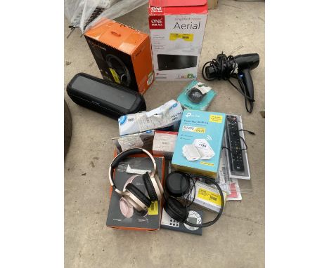 AN ASSORTMENT OF ELECTRICAL ITEMS TO INCLUDE HEADPHONES, A SPEAKER AND REMOTE CONTROLS ETC 