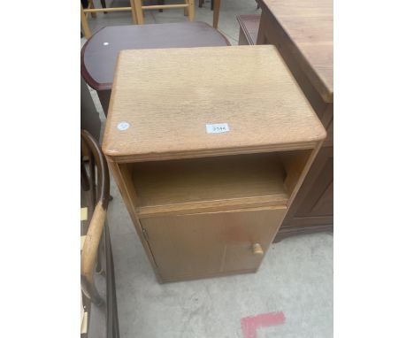 A LIGHT OAK BEDSIDE LOCKER 