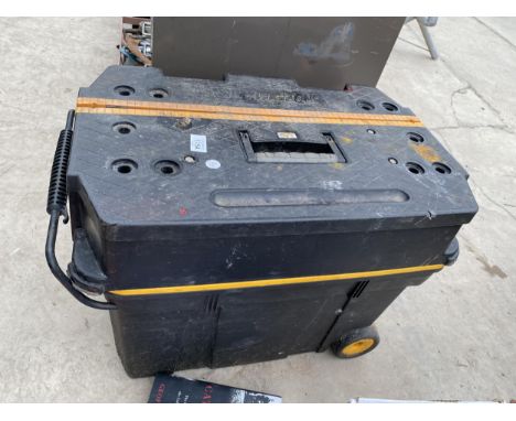 A LARGE PLASTIC TOOL BOX WITH AN ASSORTMENT OF TOOLS INCLUDED 
