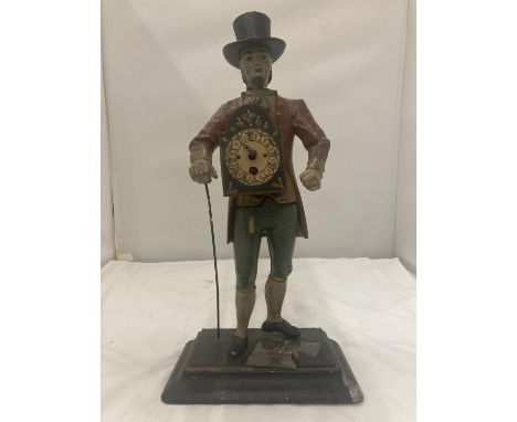 A VINTAGE CAST ALLOY FIGURE OF A DUTCH CLOCK SELLER H: 40CM 