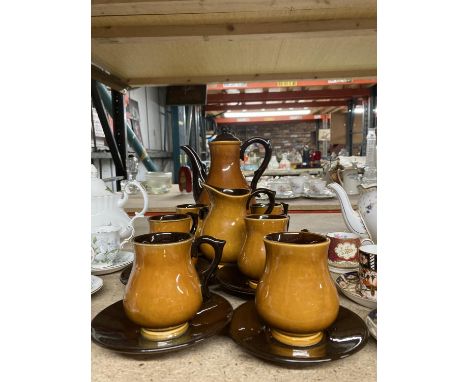 A BOULTON STONEWARE CARAMEL COLOURED COFFEE SET TO INCLUDE A COFFEE POT, CREAM JUG, SIX CUPS AND SAUCERS 