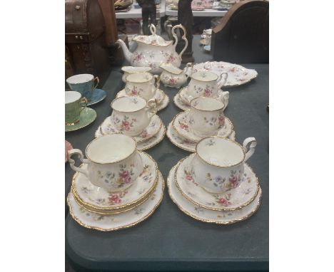 A ROYAL ALBERT 'TENDERNESS' TEASET TO INCLUDE TEAPOT, CAKE PLATE, CREAM JUG, SUGAR BOWL, CUPS, SAUCERS AND SIDE PLATES 