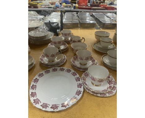 A ROYAL VALE TEASET IN WHITE WITH RED LEAF PATTERN TO INCLUDE A CAKE PLATE, CREAM JUG, SUGAR BOWL, CUPS, SAUCERS AND SIDE PLA