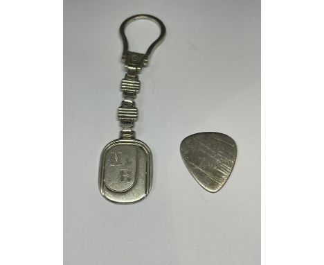 A MARKED SILVER KEYRING AND STERLING SILVER  PLECTRUM 