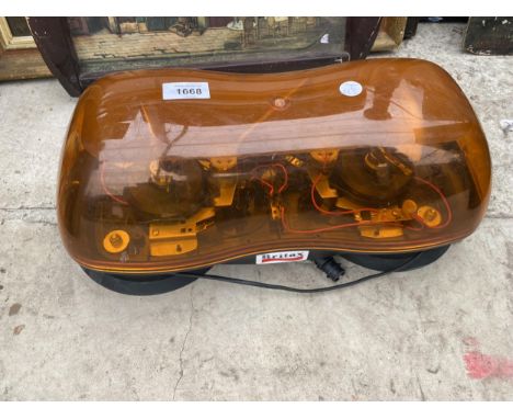 A VEHICLE ORANGE FLASHING LIGHT 