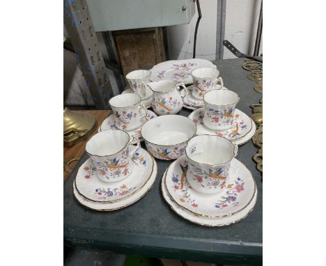 A HAMMERSLEY CHINA ( PART OF THE SPODE GROUP) TEASET WITH A BIRD OF PARADISE DESIGN TO INCLUDE A CAKE PLATE, CREAM JUG, SUGAR