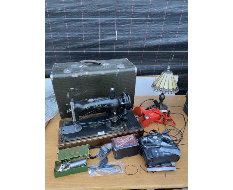 AN ASSORTMENT OF ITEMS TO INCLUDE A SINGER SEWING MACHINE, A LAMP AND A R/C CAR CONTROLLER ETC 