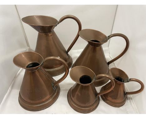 A SET OF FIVE VINTAGE GRADUATED COPPER JUGS 