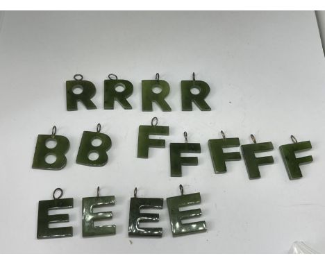 FIFTEEN JADE LETTER PENDANTS TO INCLUDE B,R,F AND E 