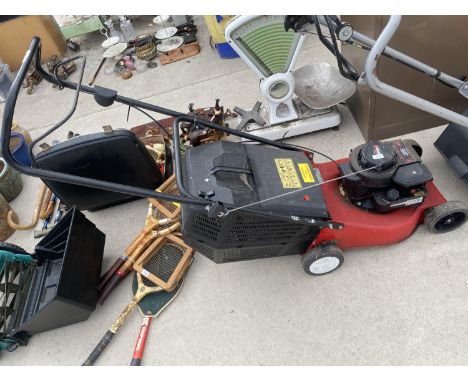 A CHAMPION PETROL ENGINE LAWN MOWER 