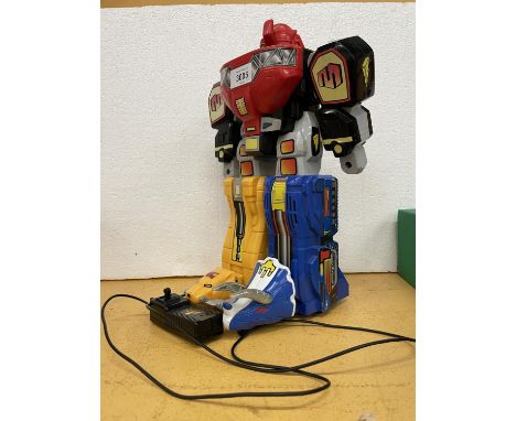 A VINTAGE 1994 MARCHON POWER RANGERS REMOTE CONTROL MEGAZORD IN WORKING ORDER BUT NO WARRANTY GIVEN ALL PROCEEDS FROM THIS LO
