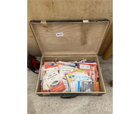 A VINTAGE TRAVEL CASE WITH A LARGE QUANTITY OF VINTAGE RUGBY LEAGUE PROGRAMMES 