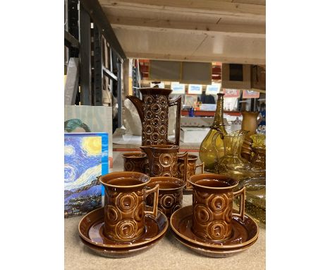 A PORTMEIRION TREACLE COLOURED CIRCLE DESIGN COFFEE SET TO INCLUDE A COFFEE POT, CREAM JUG, SUGAR BOWL,  FOUR CUPS AND SIX SA