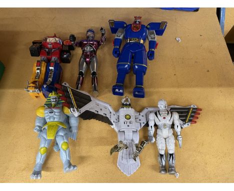 A COLLECTION OF SIX VINTAGE 1990'S POWER RANGERS TRANSFORMERS AND ACTION MEN ALL PROCEEDS FROM THIS LOT ARE BEING KINDLY DONA