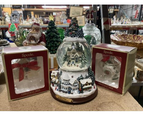 A COLLECTION OF CHRISTMAS ORNAMENTS TO INCLUDE A LARGE SNOW GLOBE, A SNOW SCENE IN A GLASS BELL,SANTA AND A CHRISTMAS TREE AN