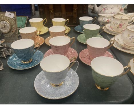 A QUANTITY OF ROYAL ALBERT 'GOSSAMER' CUPS AND SAUCERS IN DIFFERENT COLOURS ( 10 IN TOTAL ) 