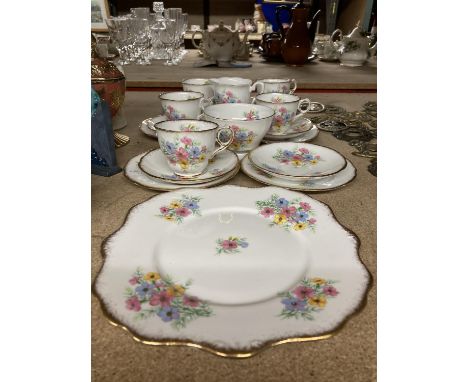 A ROYAL STAFFORD 'VIRGINIA STOCK' TEASET TO INCLUDE CAKE PLATE, SSUGAR BOWL, CREAM JUG, SAUCERS, SIDE PLATES AND FIVE CUPS 