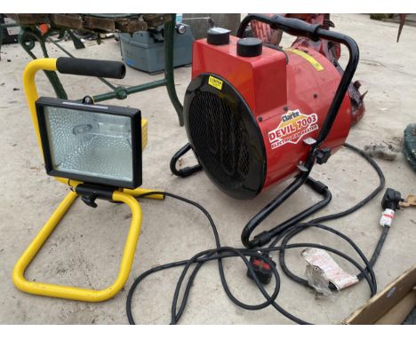 A CLARKE DEVIL 7003 ELECTRIC FAN HEATER AND A WORK LIGHT BOTH BELIEVED WORKING BUT NO WARRANTY 