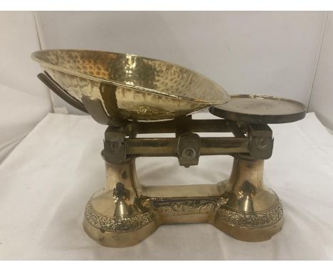 A SET OF BRASS SCALES WITH BEATEN PAN 