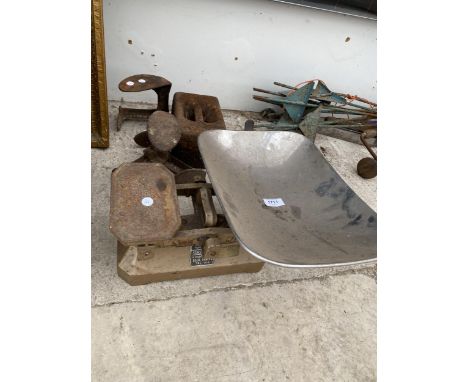 A SET OF SIMS BROS KITCHEN SCALES, TWO COBBLERS LASTS AND A 56LB WEIGHT 