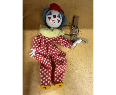 A PELHAM PUPPET OF A CLOWN 