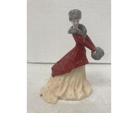 A ROYAL WORCESTER FIGURINE FROM THE LES PETITES A11 COLLECTION "LARA CHRISTMAS MORNING" - 18 CM 