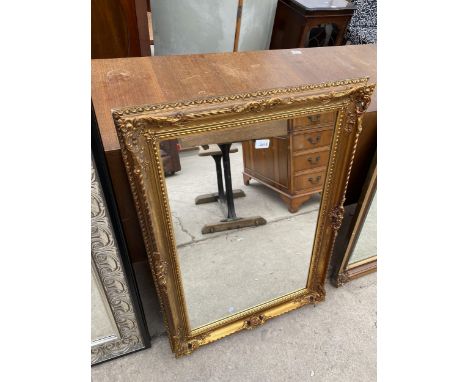 A MODERN GILT FRAMED WALL MIRROR, 36X26" 