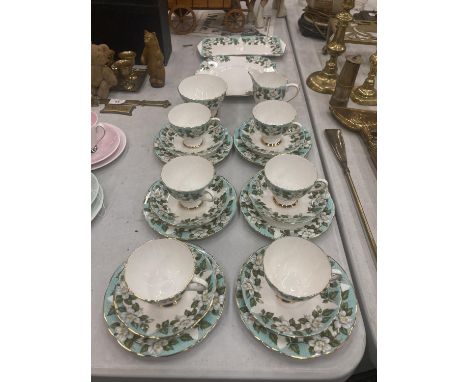 A GLADSTONE 'MONTROSE' CHINA TEASET WITH A FLORAL DESIGN TO INCLUDE CAKE PLATE, SANDWICH TRAY, CREAM JUG, SUGAR BOWL, CUPS, S