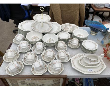 A LARGE MADE IN ENGLAND CERAMIC DINNER SERVICE TO INCLUDE PLATES, BOWLS AND TRIOS ETC 
