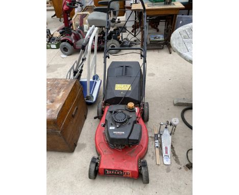 A CHAMPION LAWN MOWER WITH HONDA PETROL ENGINE AND GRASS BOX 