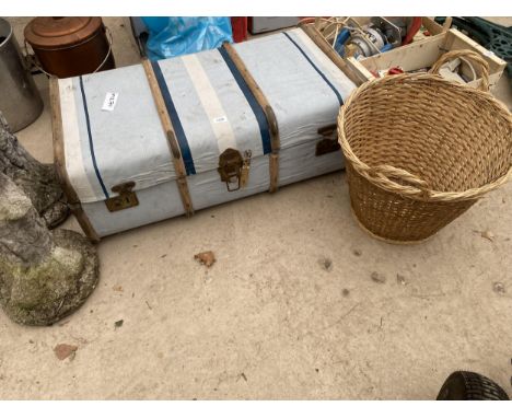 A WOODEN STORAGE TRUNK AND A WICKER BASKET 