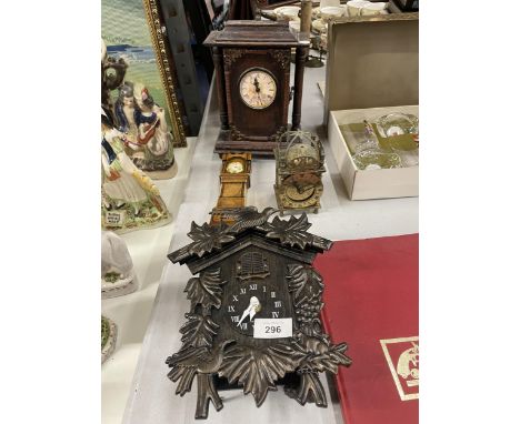 FOUR CLOCKS TO INCLUDE A CUCKOO CLOCK, VINTAGE BRASS DOMED MANTLE CLOCK, MINIATURE 'GRANDFATHER' CLOCK, ETC 