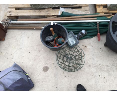 AN ASSORTMENT OF TOOLS TO INCLUDE A DRILL, A RAKE AND LONG REACH LOPPERS ETC 
