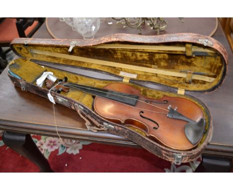 A violin, the two-piece back 36.25cm long excluding button, Stradivarius label, 60cm long overall