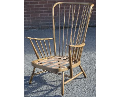 An Ercol spindle back easy chair 
