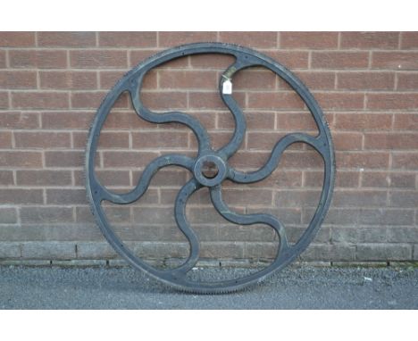 Industrial Salvage - A vintage toothed fly wheel