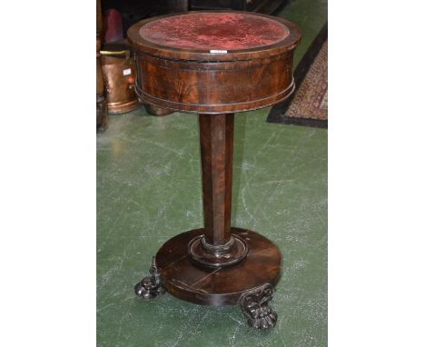 An unusual William IV metamorphic combination teapoy and centre table, rising top with inset tooled and gilt leather surface 