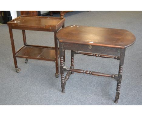 A 19th century oak side table with turned supports; an oak tea trolley/card table