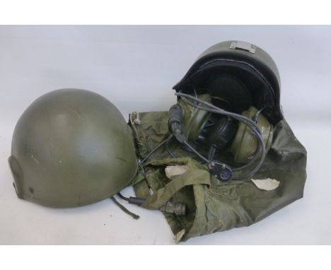 A British Army armoured vehicle helmet with liner, headphones and microphone in nits carry bag and another camouflaged armour