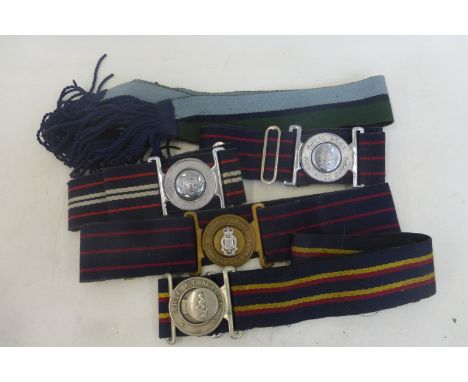 Five British Army stable belts.