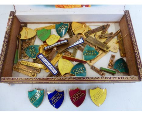 A box of enamel school badges of various ages including House Captain, Sub-prefect, Prefect; also a General Election 1910 bar
