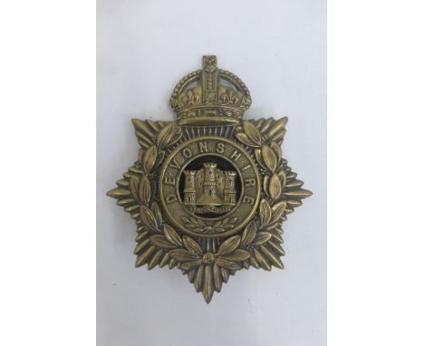 An early 20th Century Devonshire Regiment helmet plate with centre, retains its lugs to the reverse, approximately 5 x 4 3/4"