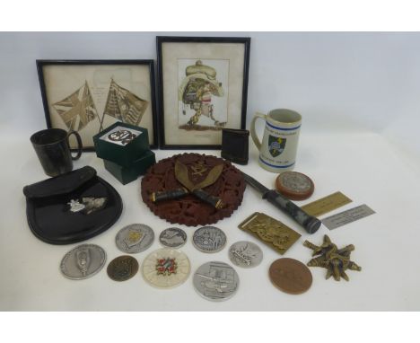 An assortment of military items including medallions, prints, a Ghurkha plaque etc.