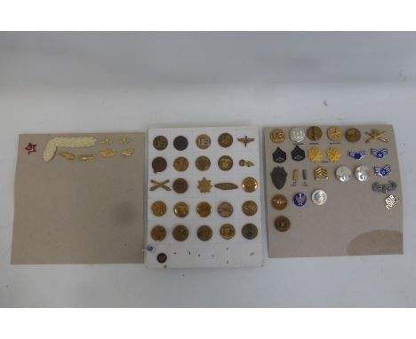 An assortment of 60 mainly U.S. Army military badges mounted on three cards. All appear to retain their fixings to the revers