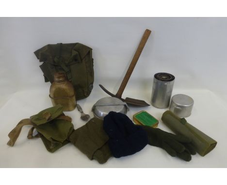 Assorted military equipment including an entrenching tool, mess tins and stove, pouches, etc.