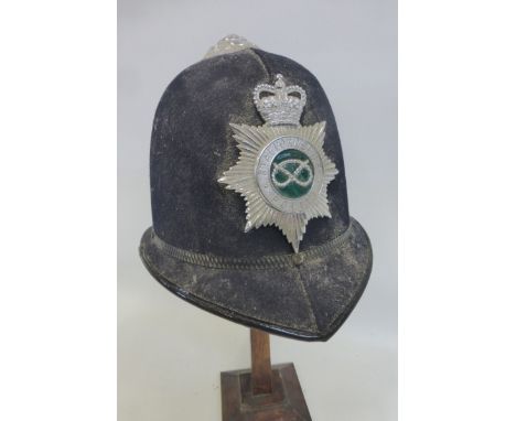 A Staffordshire Police helmet with badge, size 7 1/8.