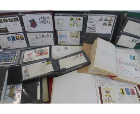 Nine albums of assorted first day covers, of various ages and subjects, including world.
