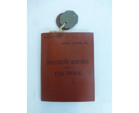 An army pay book and ID tags all named to 5663988 Private J.A. King of the Somerset Light Infantry.