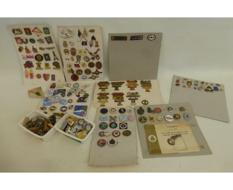 A box of assorted badges, including enamel, covering sporting themes etc., mostly mounted on cards.